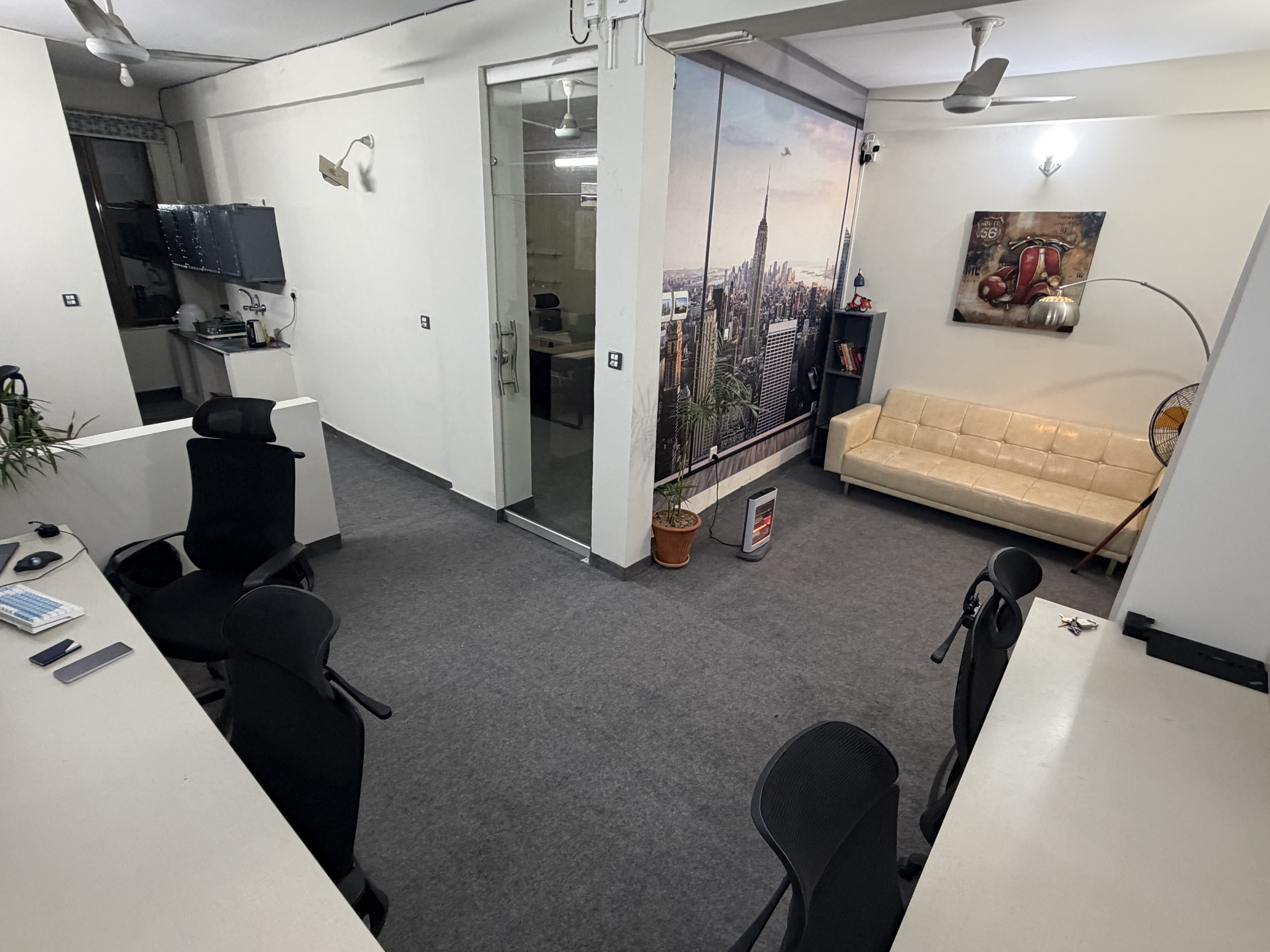 Open lounge area with natural light and plants